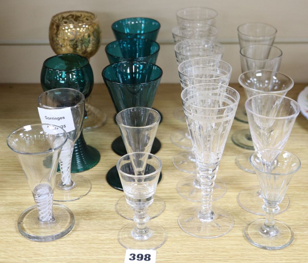 A collection of green glass and cut glass